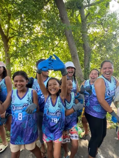 Members of the Ocean Blu volleyball team in matching jerseys.